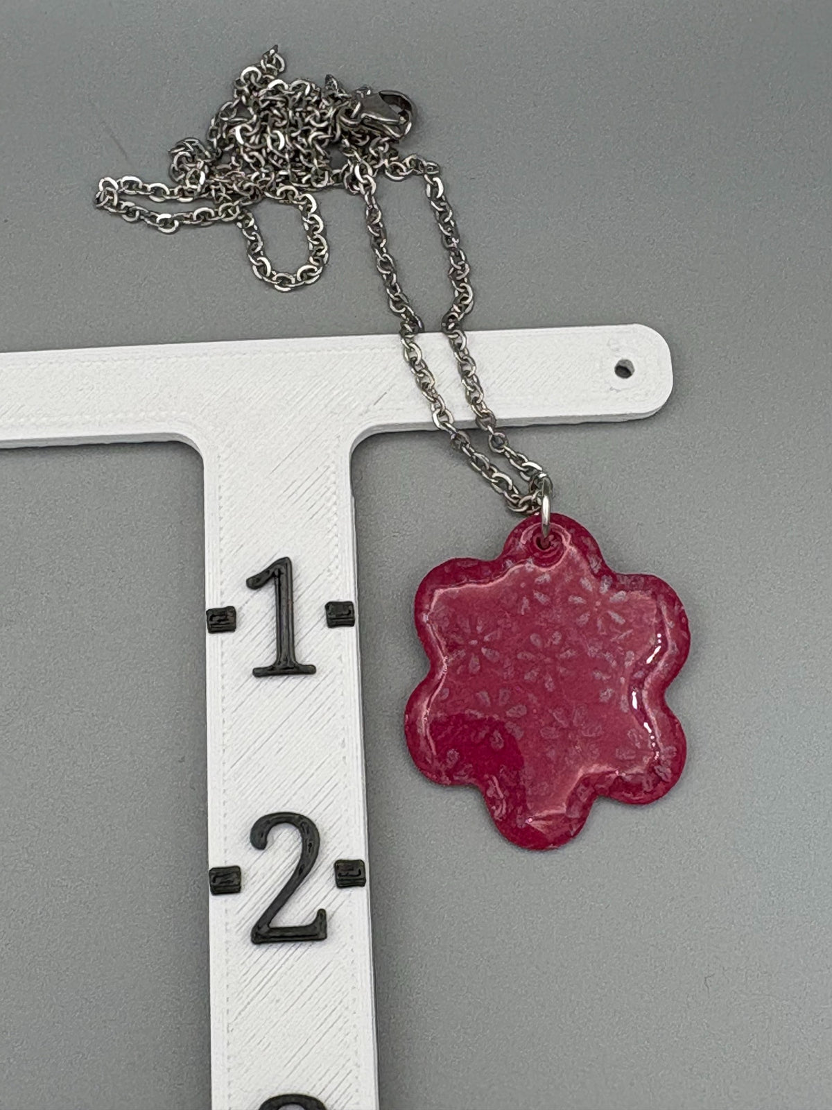 Collier fleur texturé
