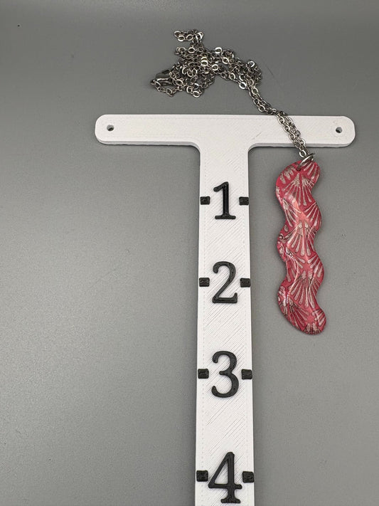 Collier torsadé Art déco rose