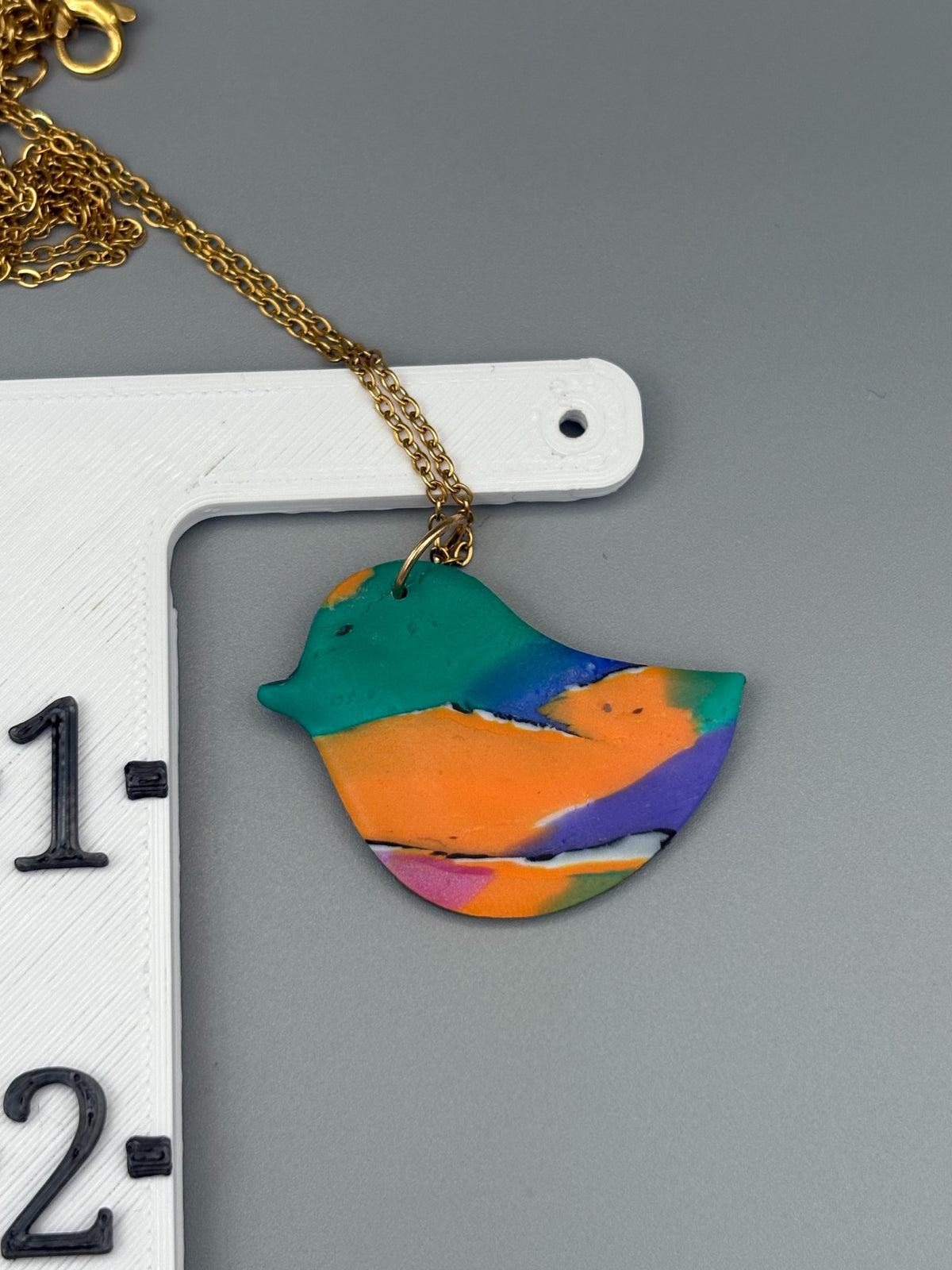 Collier oiseau aquarelle