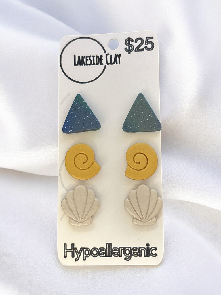 Triangles, Swirl Shells, Shells Stud Earrings - handcrafted polymer clay earrings by Lakeside Clay