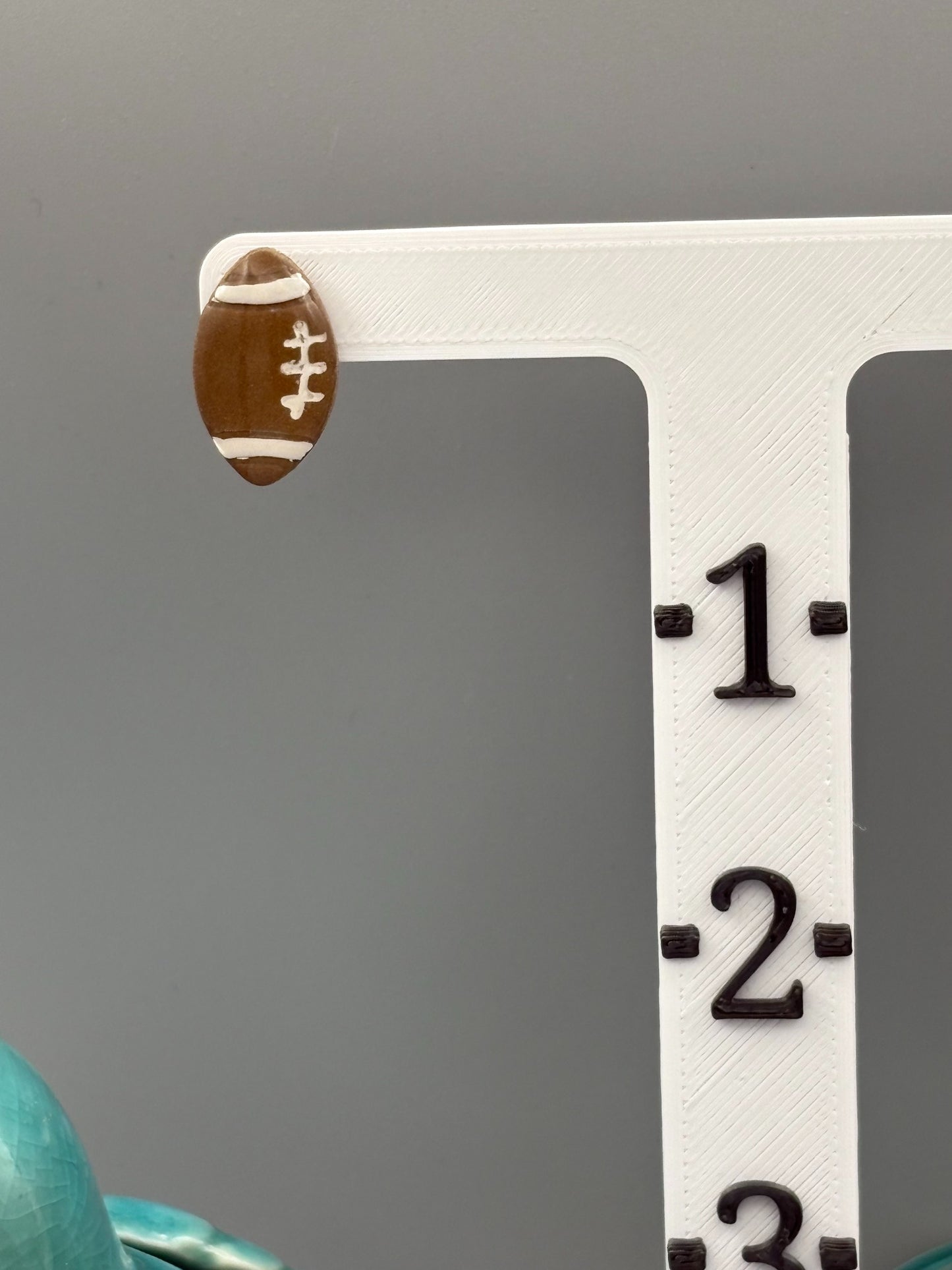 Football Stud Earrings - handcrafted polymer clay earrings by Lakeside Clay