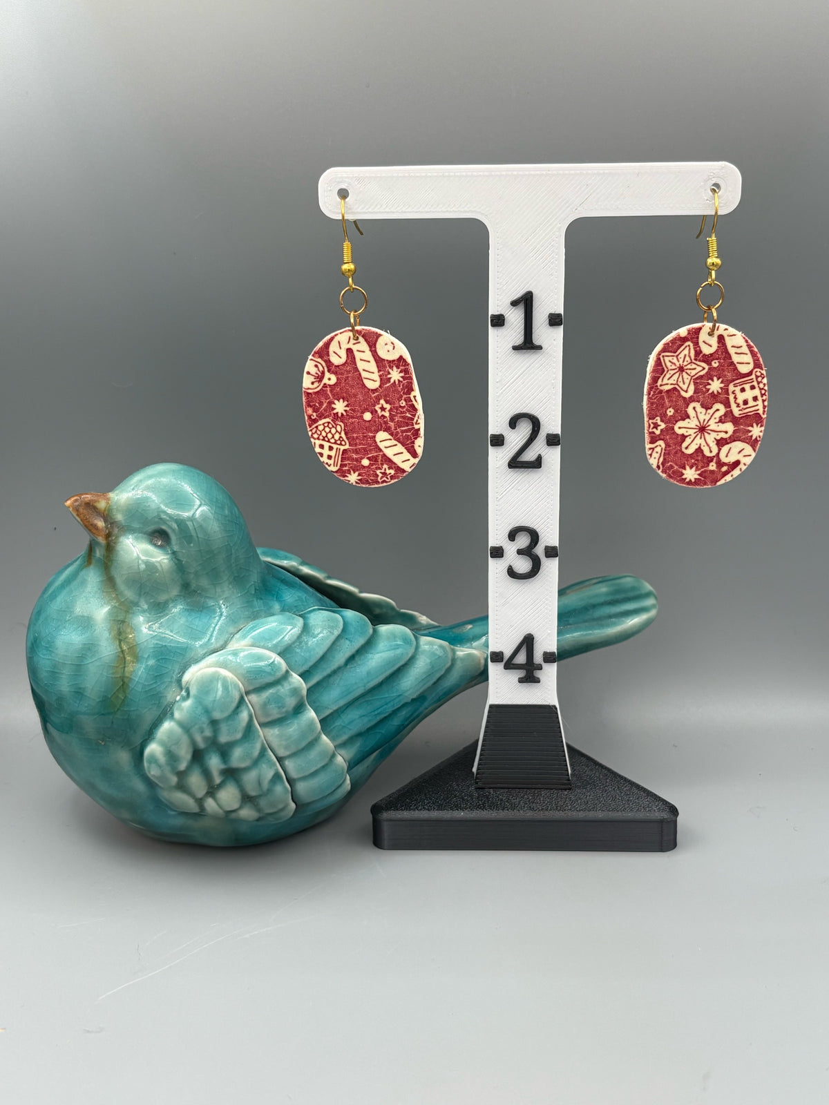 Red Christmas Pattern Oval Dangle Earrings - handcrafted polymer clay earrings by Lakeside Clay
