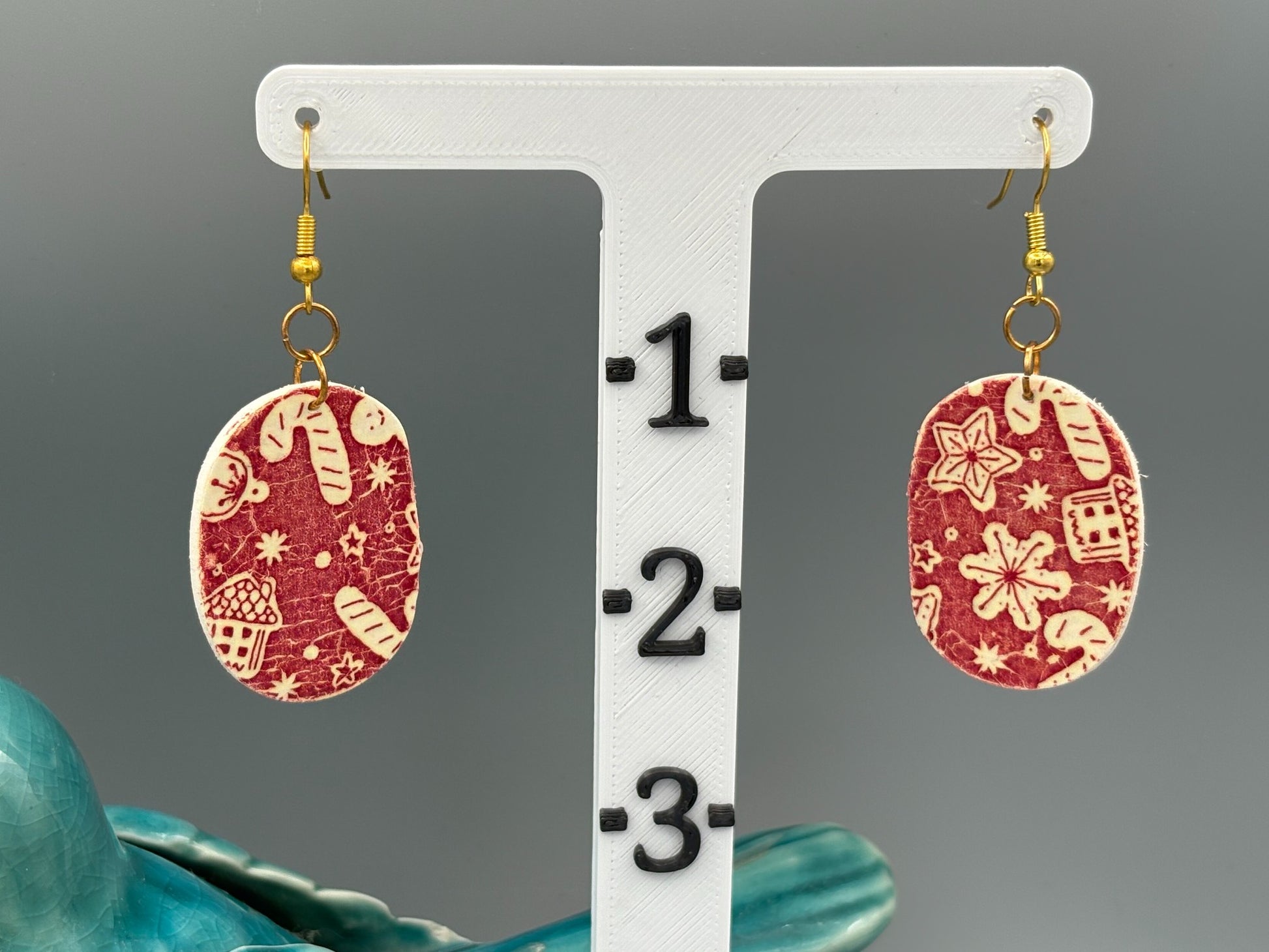 Red Christmas Pattern Oval Dangle Earrings - handcrafted polymer clay earrings by Lakeside Clay