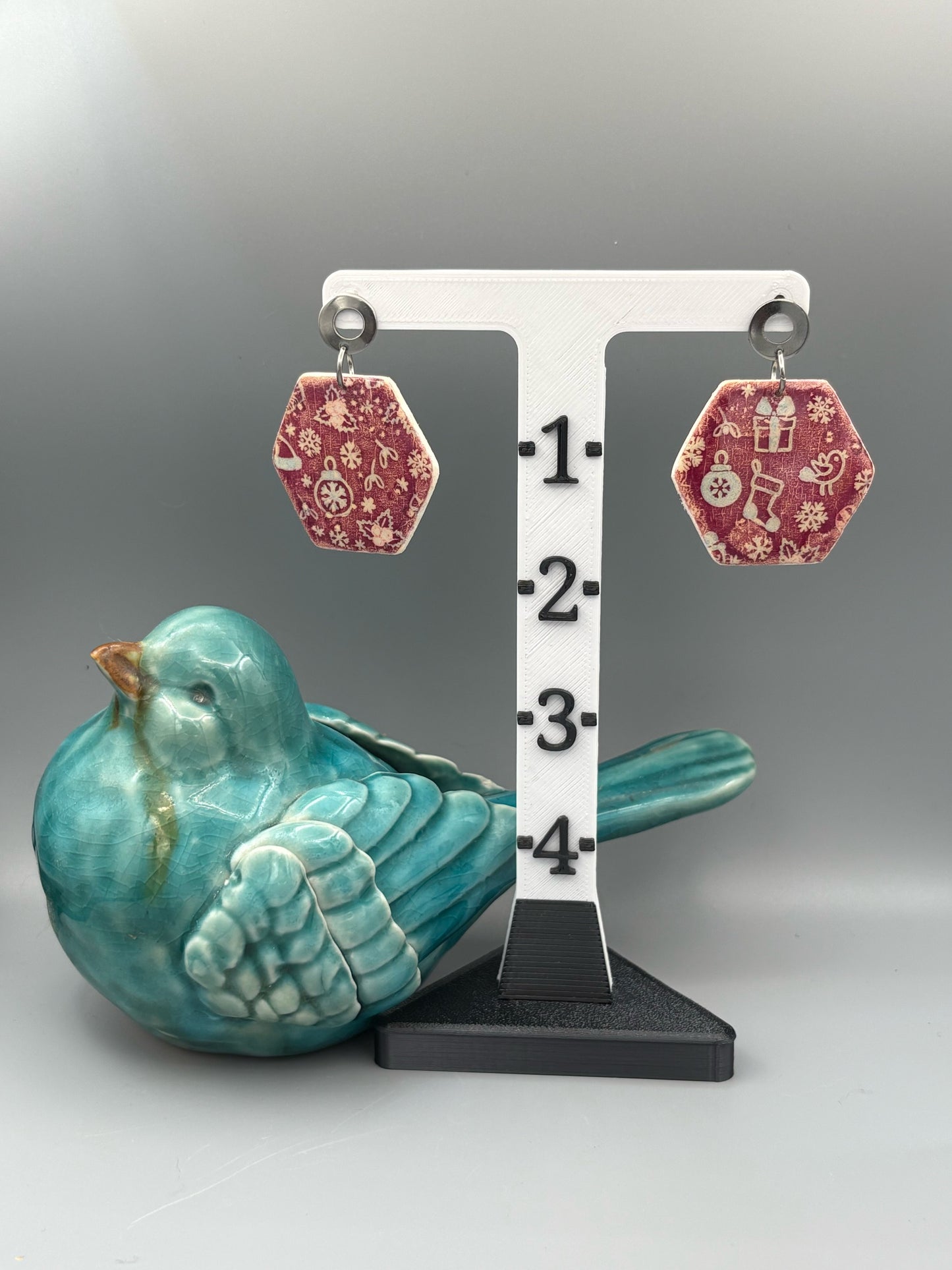 Red Christmas Pattern Hexagon Dangle Earrings - handcrafted polymer clay earrings by Lakeside Clay