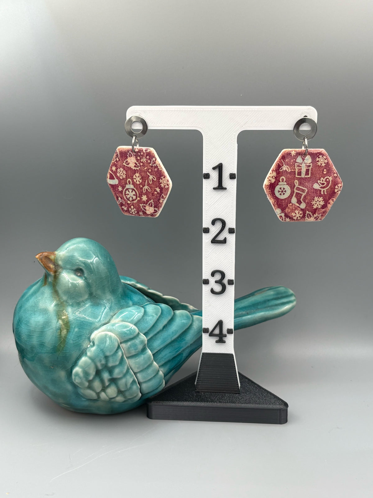 Red Christmas Pattern Hexagon Dangle Earrings - handcrafted polymer clay earrings by Lakeside Clay
