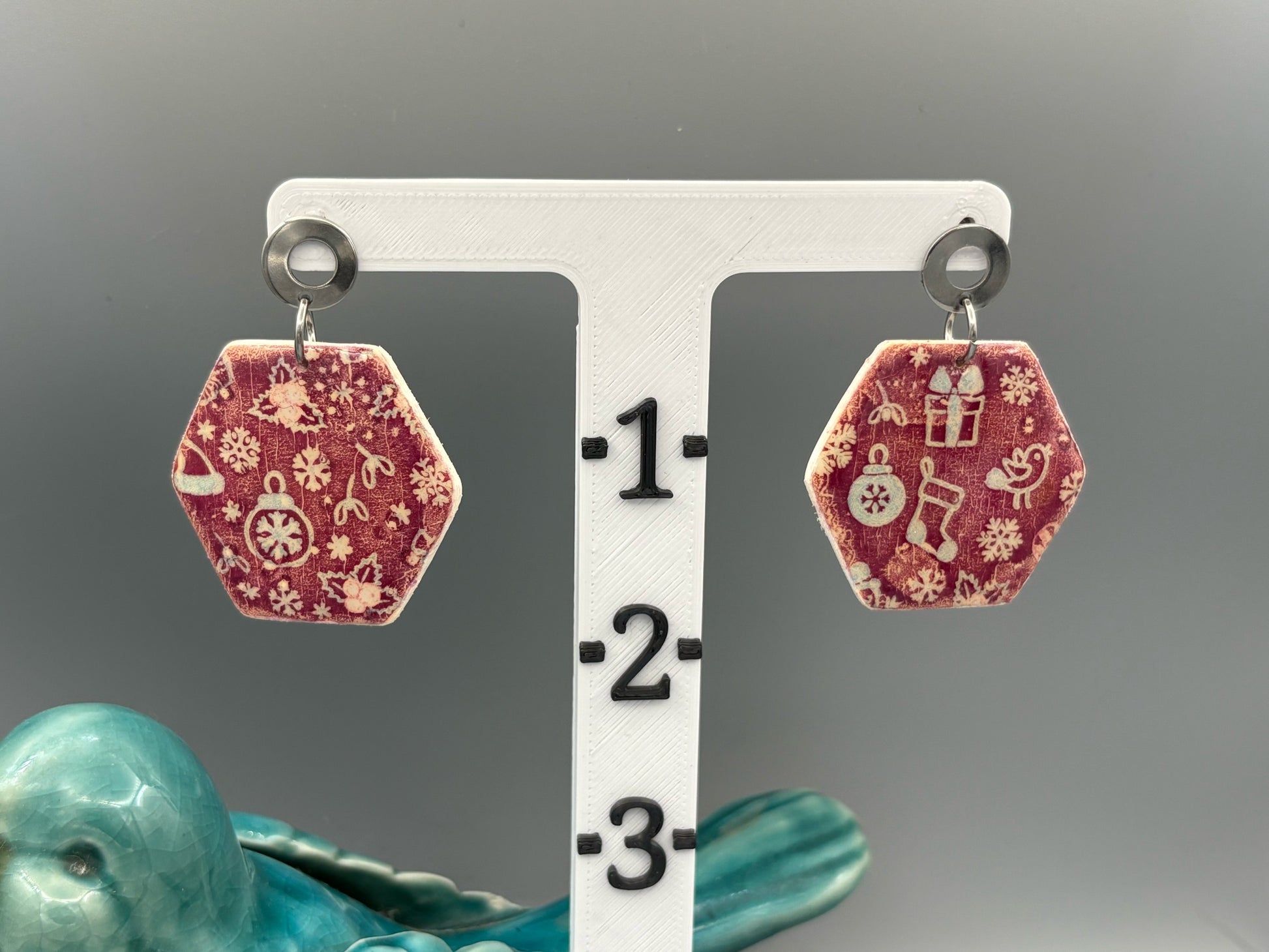 Red Christmas Pattern Hexagon Dangle Earrings - handcrafted polymer clay earrings by Lakeside Clay