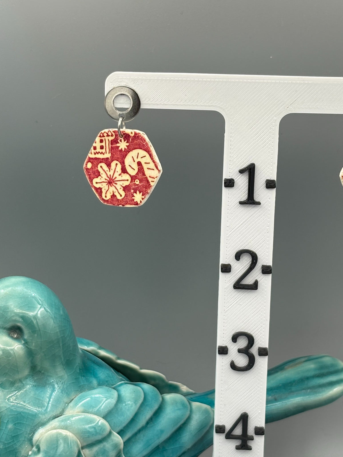 Red Christmas Pattern Hexagon Dangle Earrings - handcrafted polymer clay earrings by Lakeside Clay