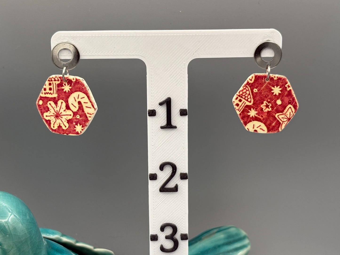 Red Christmas Pattern Hexagon Dangle Earrings - handcrafted polymer clay earrings by Lakeside Clay