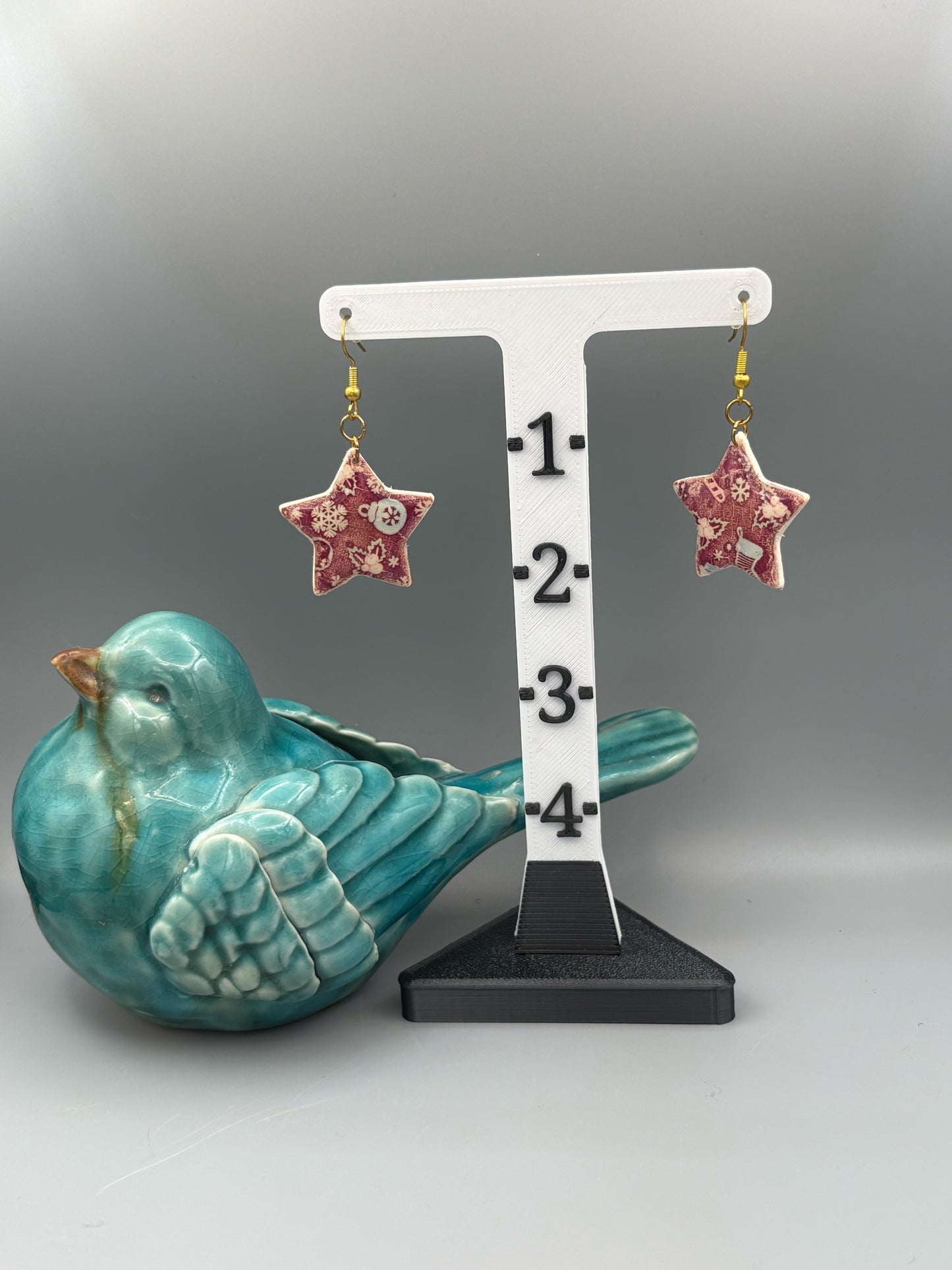 Red Christmas Pattern Star Dangle Earrings - handcrafted polymer clay earrings by Lakeside Clay