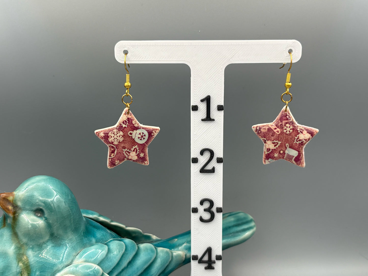 Red Christmas Pattern Star Dangle Earrings - handcrafted polymer clay earrings by Lakeside Clay