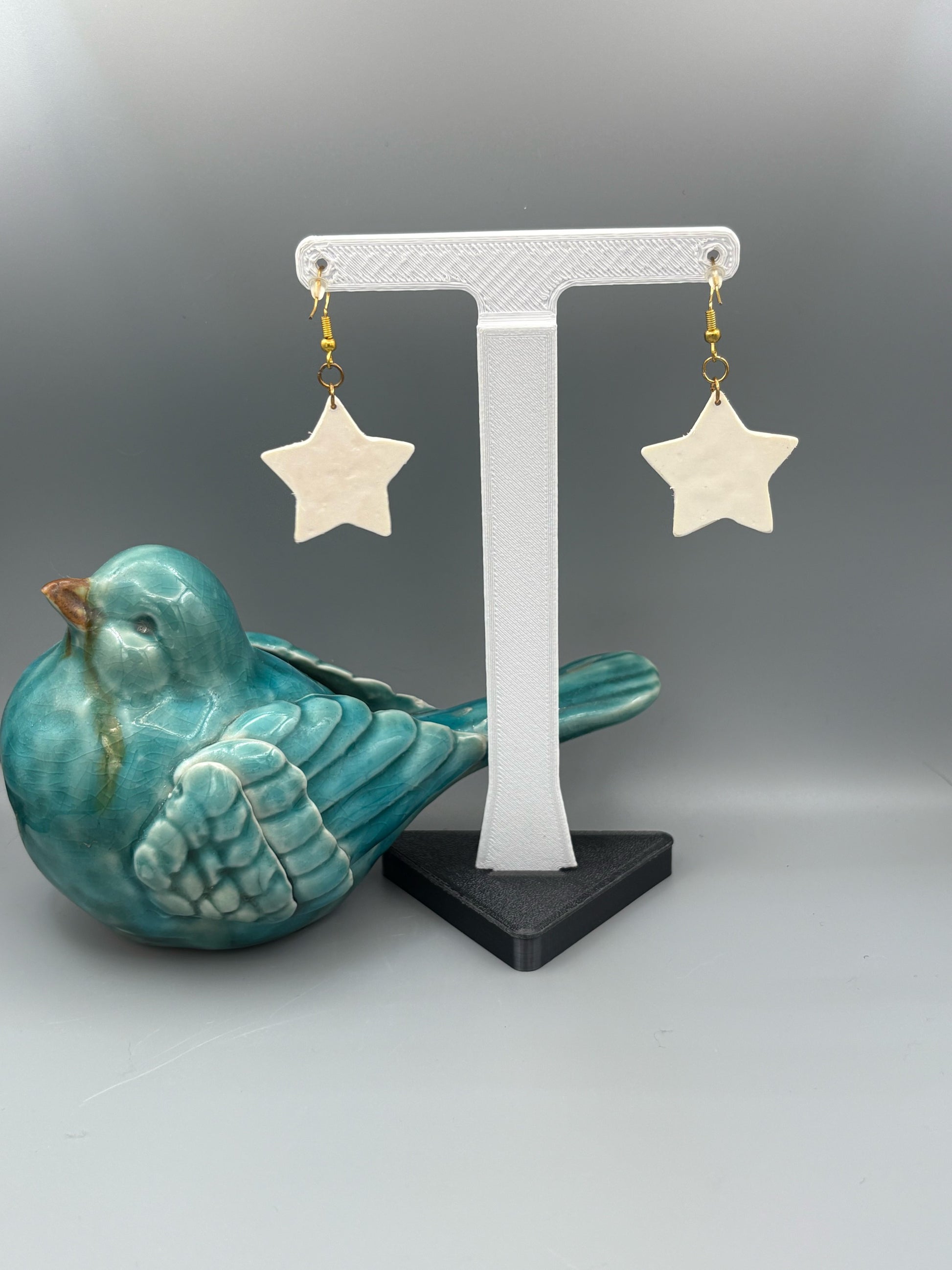 Red Christmas Pattern Star Dangle Earrings - handcrafted polymer clay earrings by Lakeside Clay