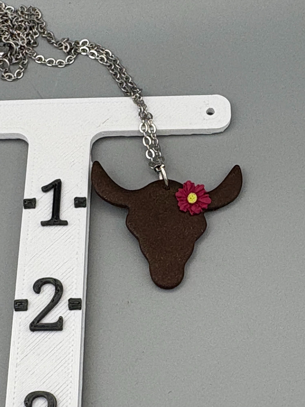 Steer with Magenta Flower Necklace