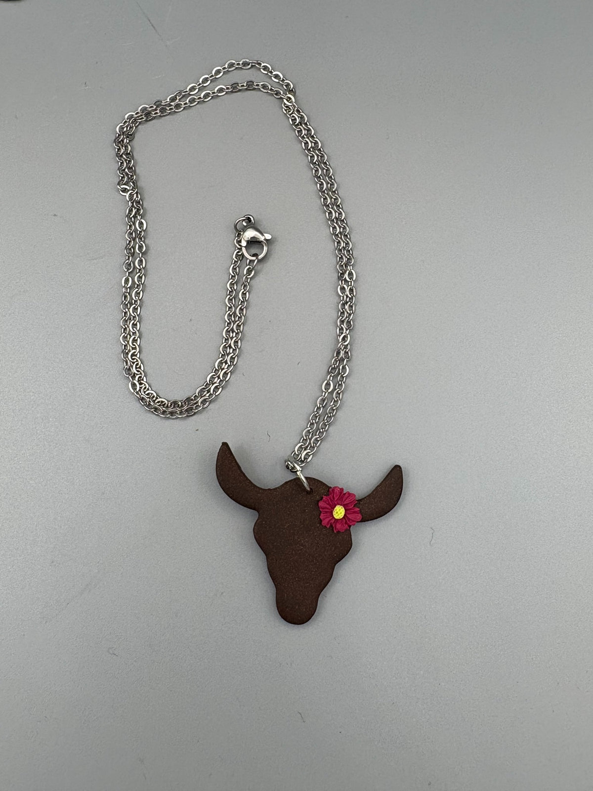 Steer with Magenta Flower Necklace