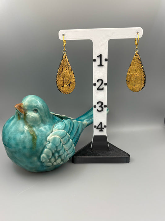 Boucles d'oreilles pendantes élégantes dorées
