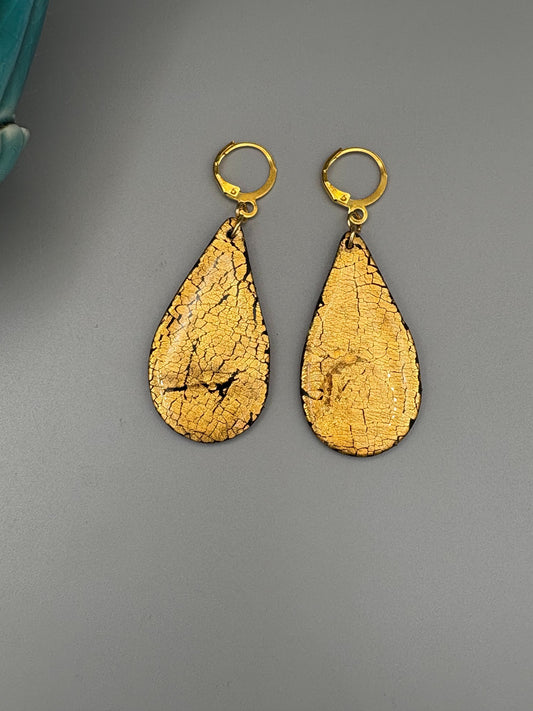 Boucles d'oreilles pendantes élégantes dorées