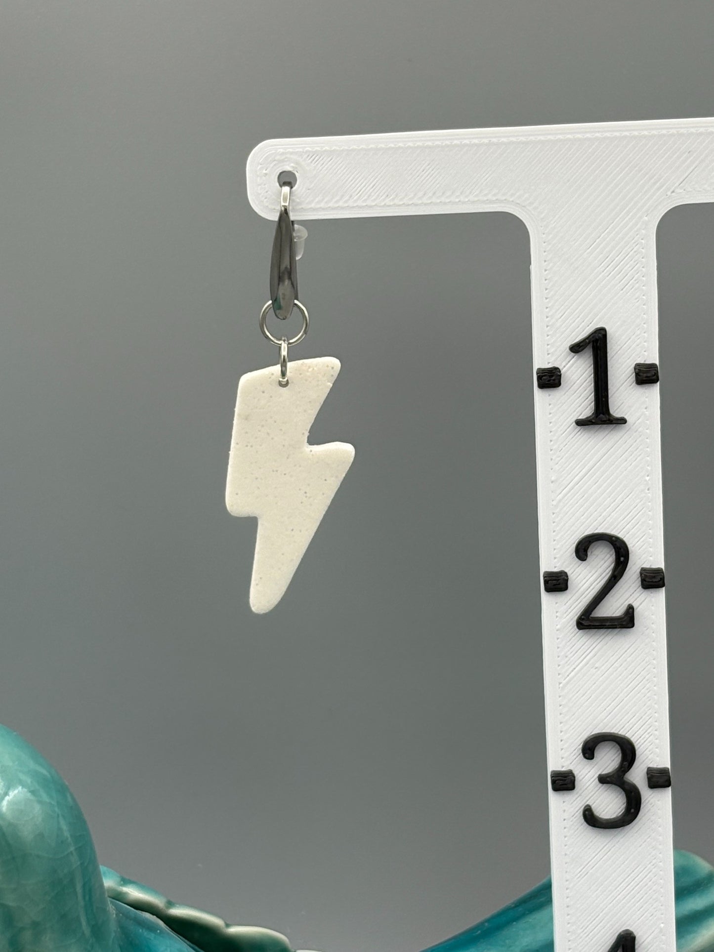 White Sparkly Lightning Bolt Dangle Earrings - handcrafted polymer clay earrings by Lakeside Clay