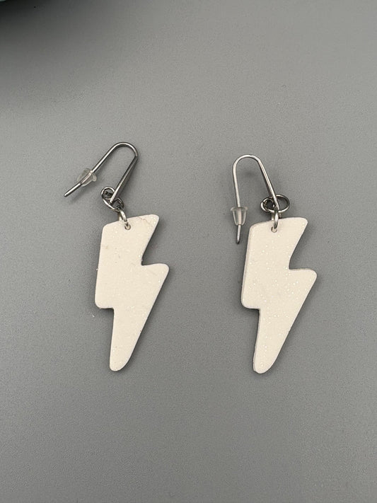 White Sparkly Lightning Bolt Dangle Earrings - handcrafted polymer clay earrings by Lakeside Clay