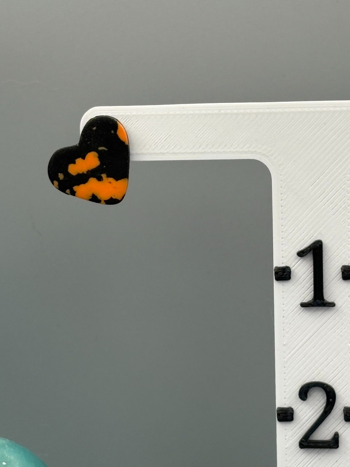 Black & Orange Heart Stud Earrings - handcrafted polymer clay earrings by Lakeside Clay