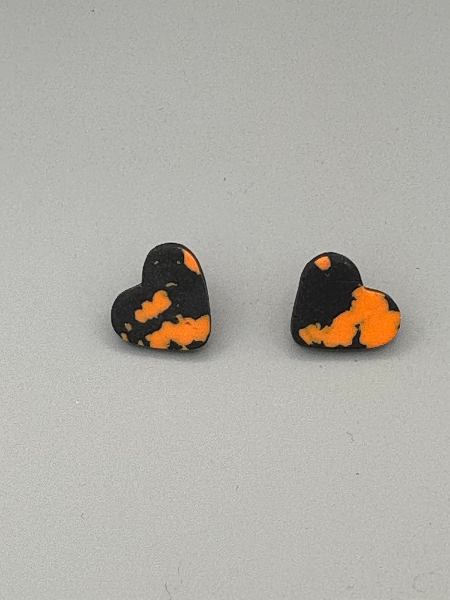 Black & Orange Heart Stud Earrings - handcrafted polymer clay earrings by Lakeside Clay
