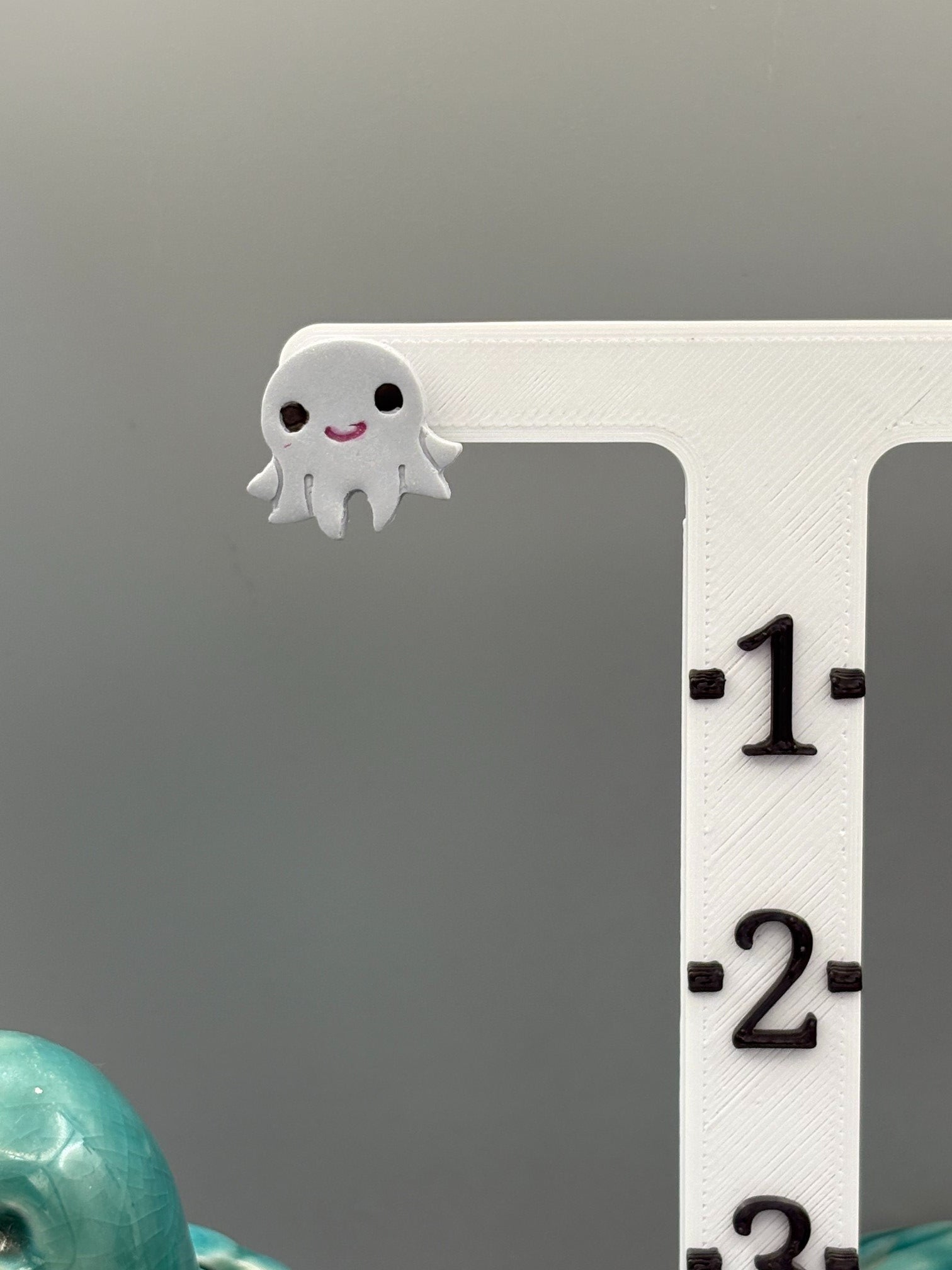 Grey Octopus Stud Earrings - handcrafted polymer clay earrings by Lakeside Clay