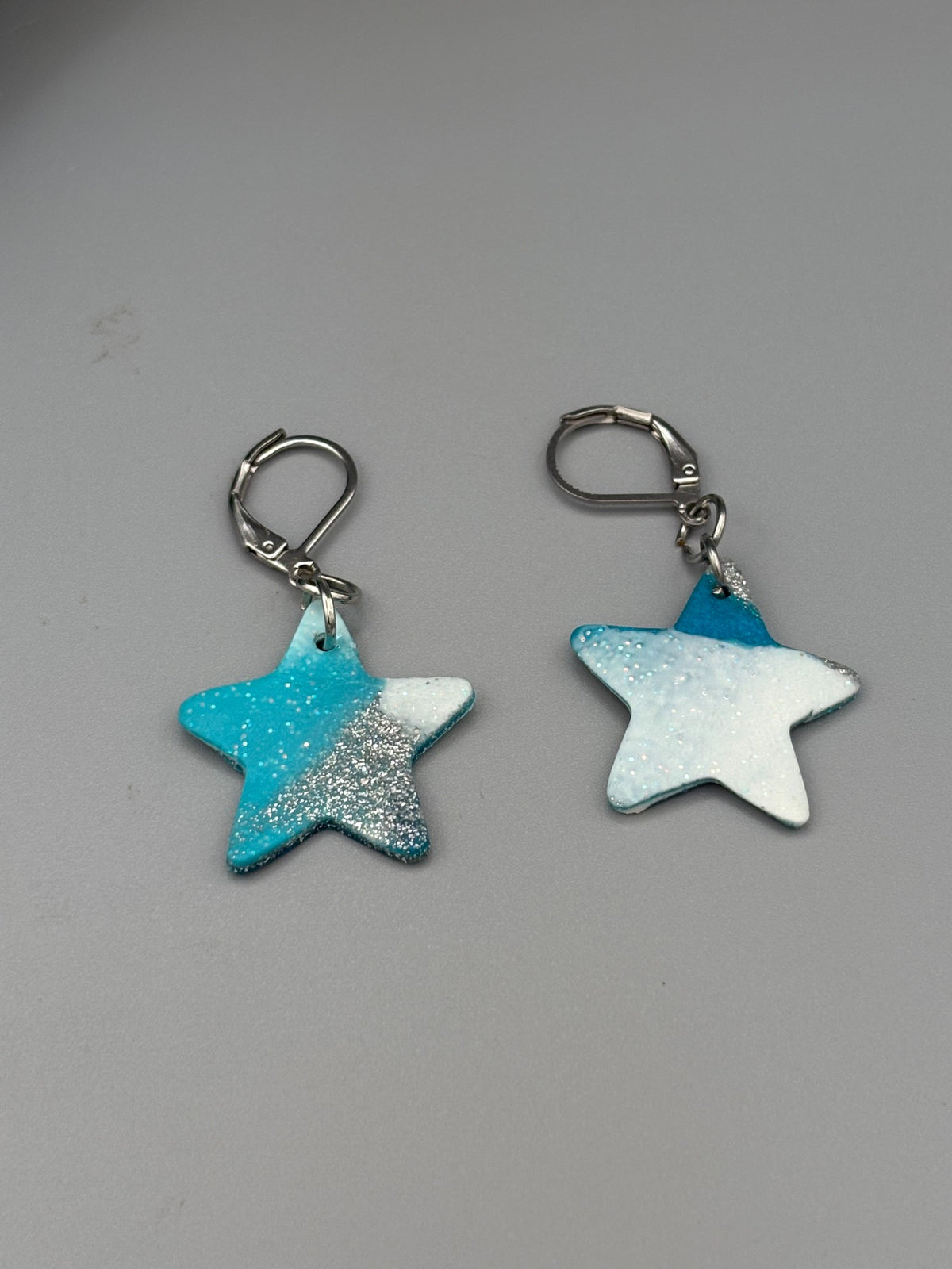 Teal & White Star Dangle Earrings - handcrafted polymer clay earrings by Lakeside Clay