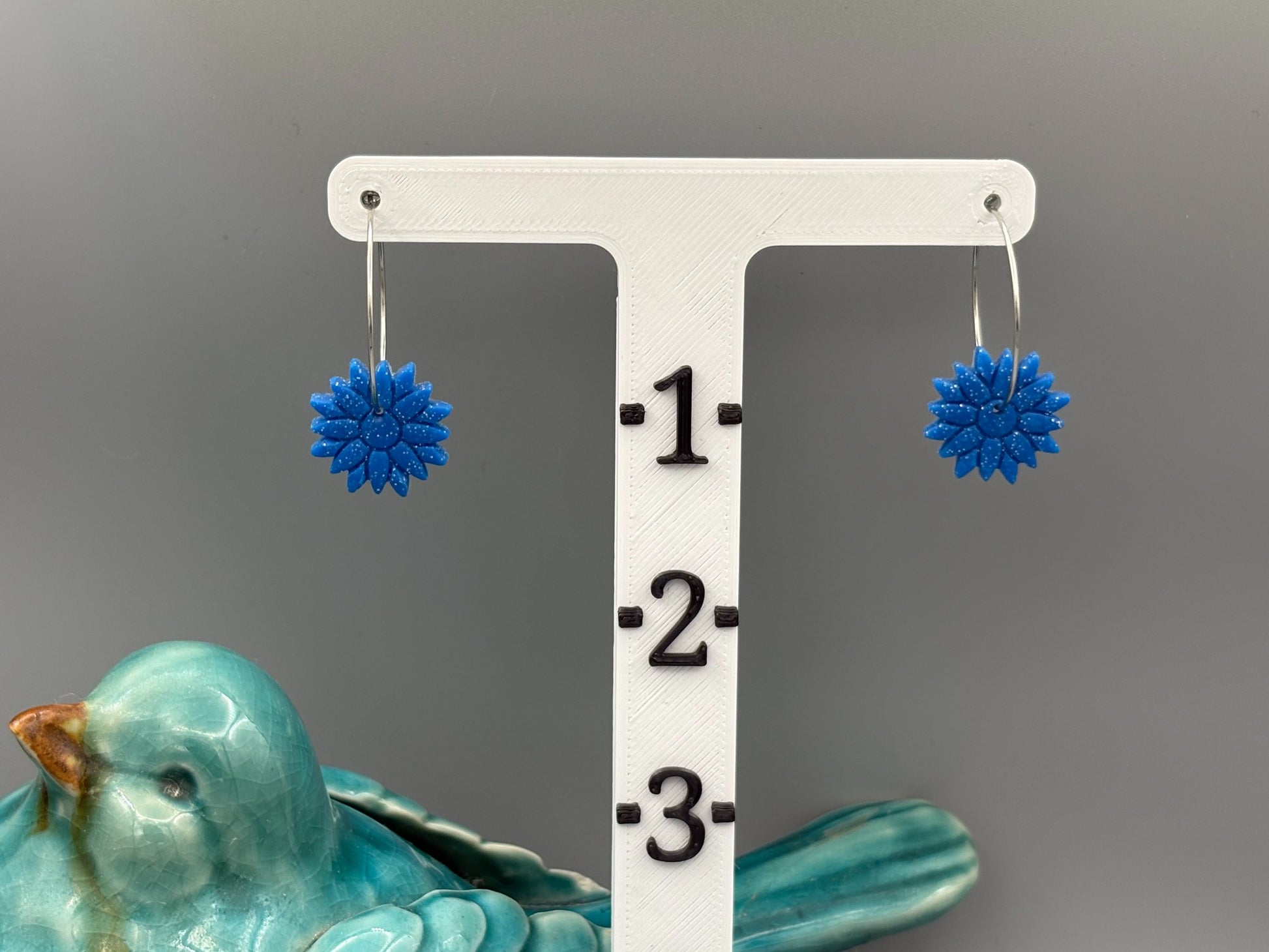 Sparkly Blue Flower Hoop Earrings - handcrafted polymer clay earrings by Lakeside Clay